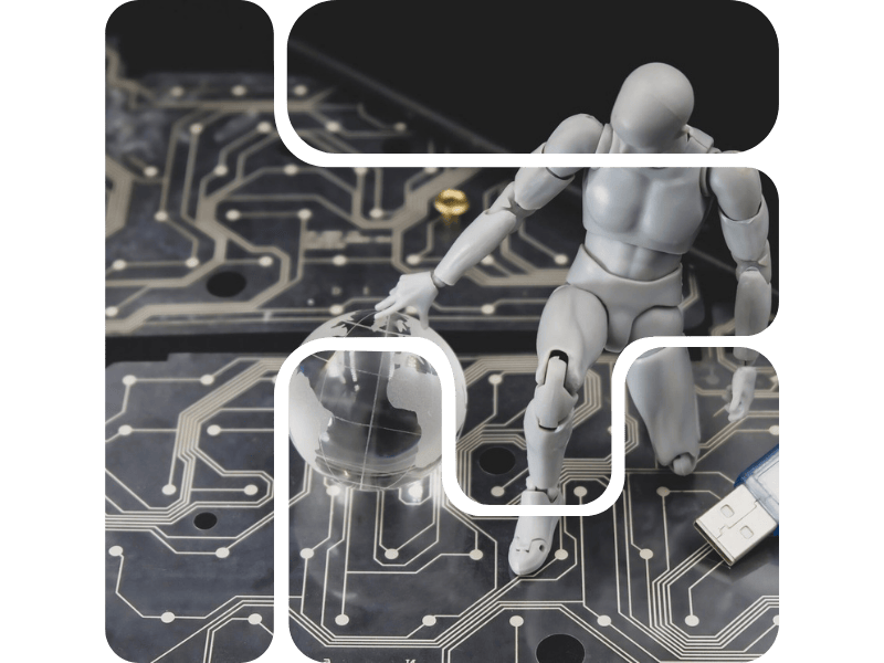 a figurine holding down a globe