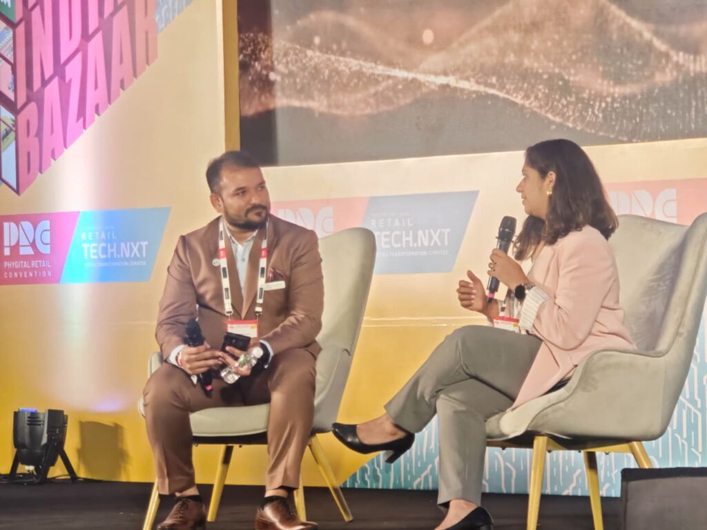 Shainil Shah from Acuver interacting on stage at the PRC