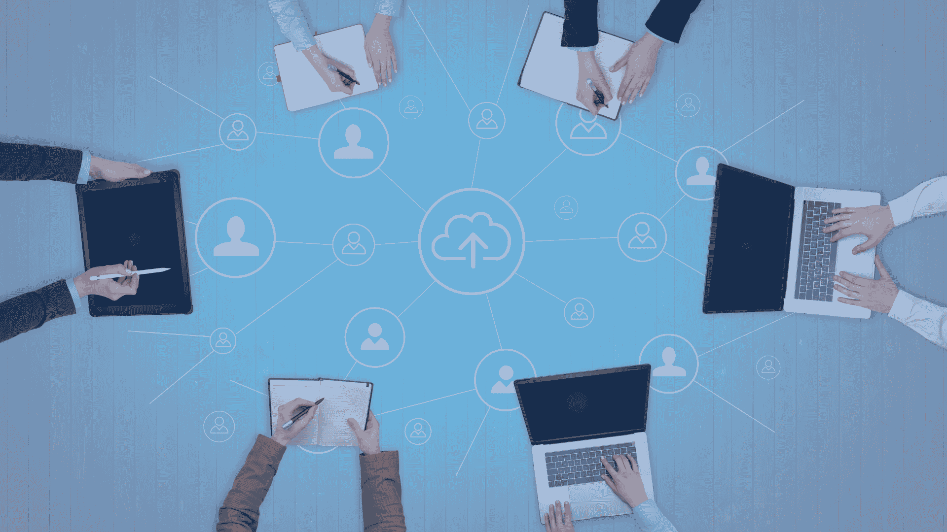 Team members connected through a cloud-based digital network
